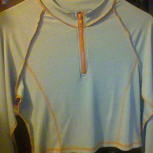 Reversed half zip up crop top